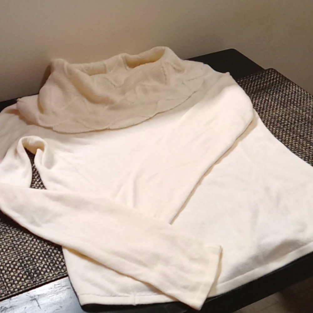 Ivory sweater.